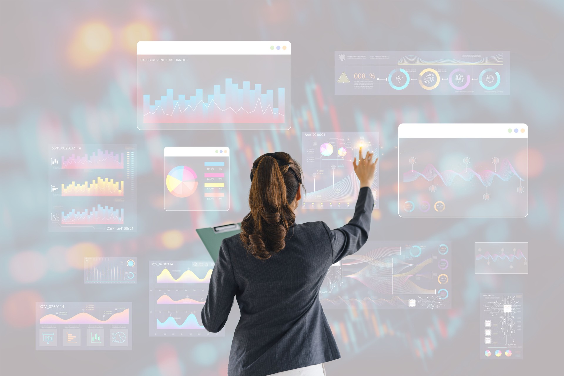 Professional woman using futuristic virtual interface to analyze data with charts and graphs.